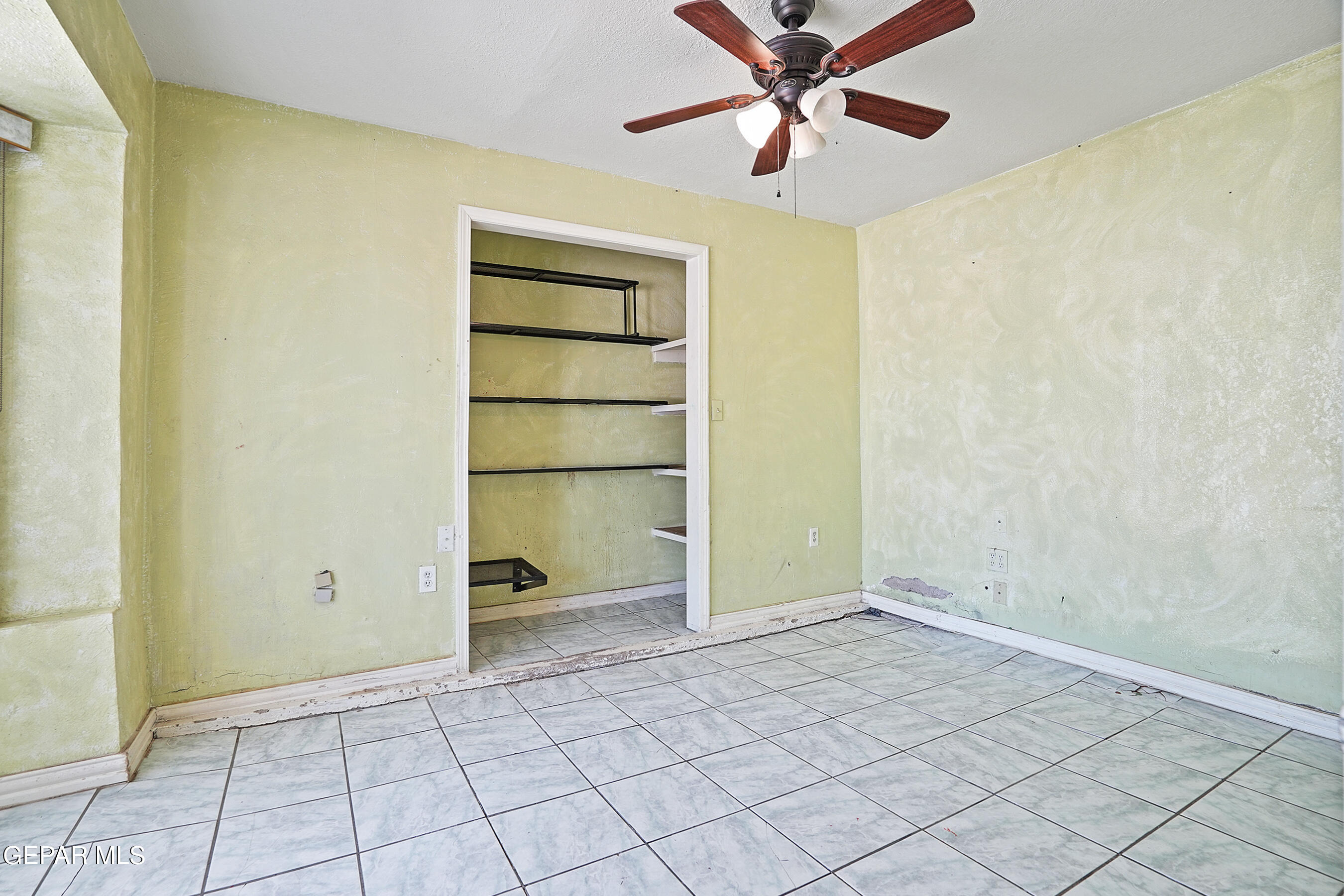 306 A Street Southwest Fabens, TX 79838 - Photo 5 of 37 a view of an empty room with a window
