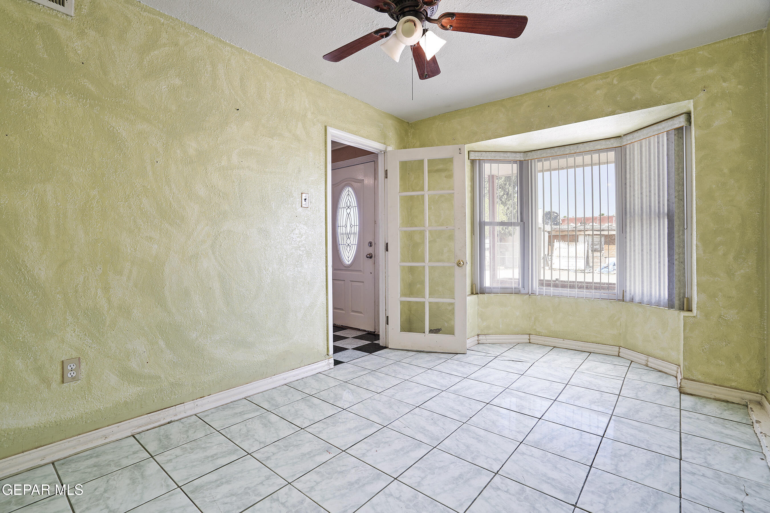 306 A Street Southwest Fabens, TX 79838 - Photo 6 of 37 a view of an empty room with a window