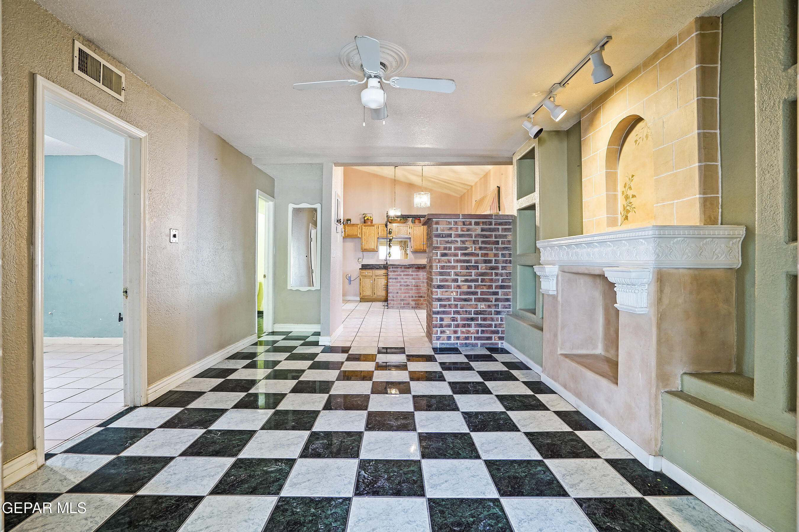 306 A Street Southwest Fabens, TX 79838 - Photo 7 of 37 a black and white checkered floor with a black white checkered floor