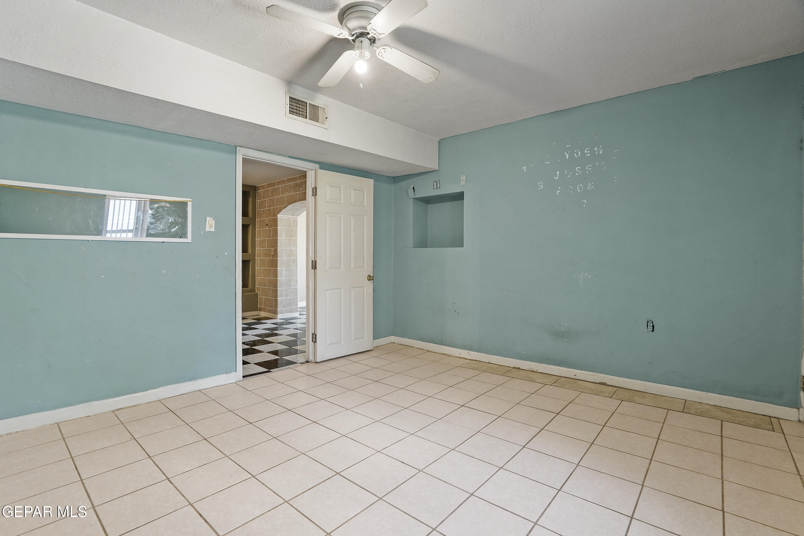 306 A Street Southwest Fabens, TX 79838 - Photo 10 of 37 a view of an empty room and window
