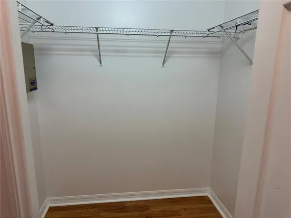 a view of a room with racks on the wall