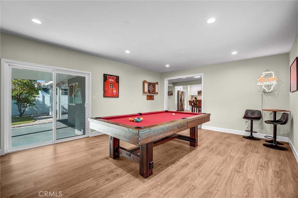 10661 Ritter Street Cypress, CA 90630 - Photo 14 of 32 Slilder to back yard off game room