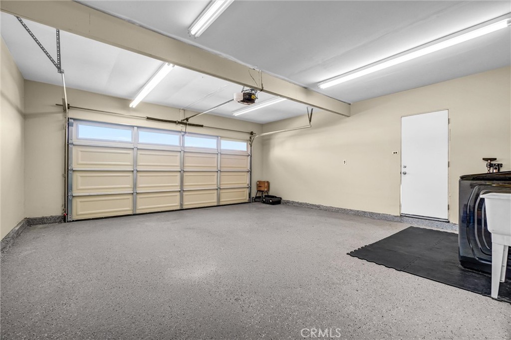 10661 Ritter Street Cypress, CA 90630 - Photo 32 of 32 very clean attached 2-car with laundry, sink and epoxy floor