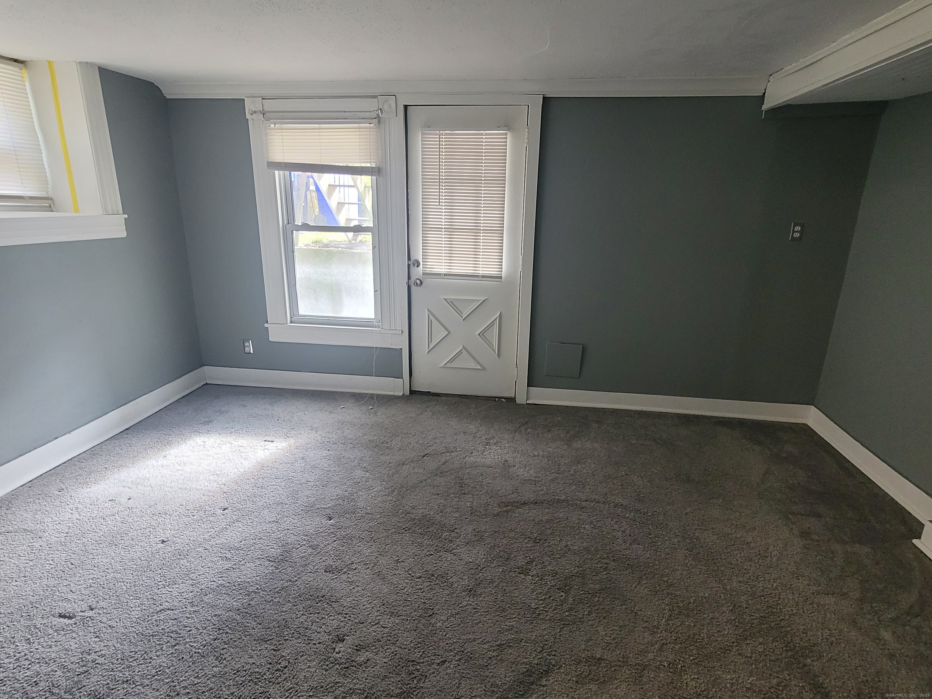 36 5th Street, Unit A Norwalk, CT 06855 - Photo 15 of 15 an empty room with windows