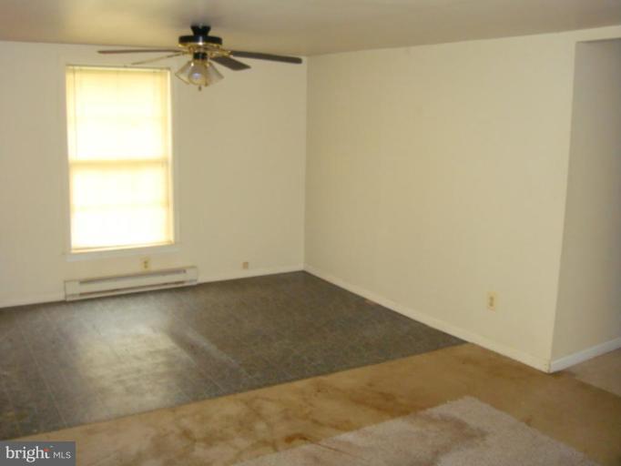 407 Lee Street Ranson, WV 25438 - Photo 3 of 6 an empty room with a window