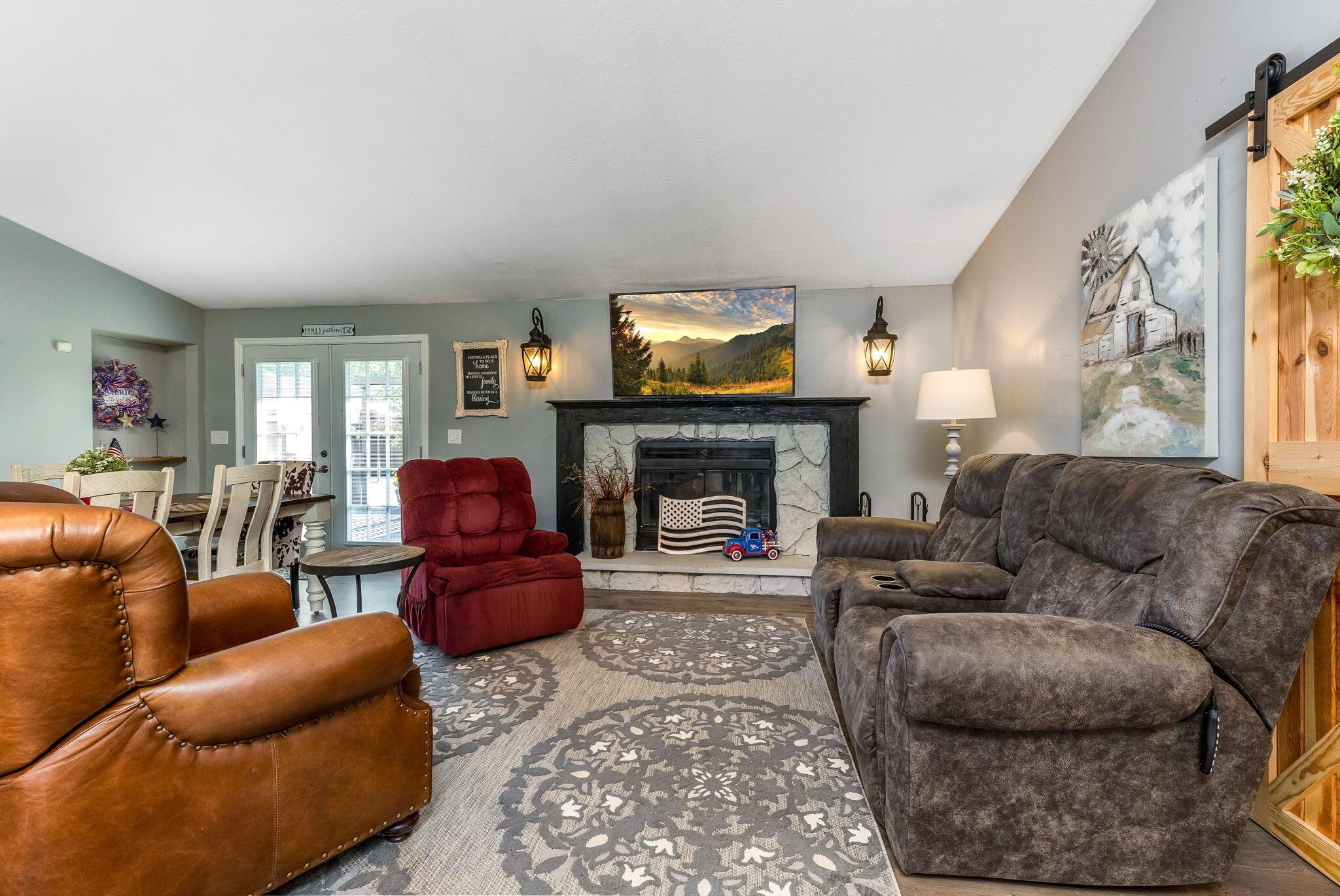 6651 Lancaster Road Hebron, OH 43025 - Photo 14 of 88 This incredible great room offers two distinct seating areas—a cozy spot to gather around the fireplace, and a more spacious section that easily accommodates additional seating for entertaining or relaxing in comfort.