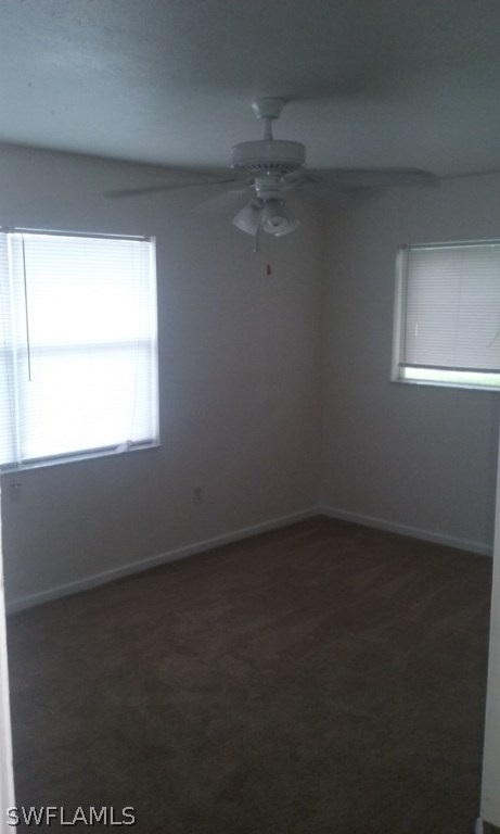 503 Bougainvillea Road West Lehigh Acres, FL 33936 - Photo 5 of 10 an empty room with a window