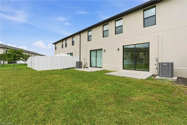 a view of a back yard of the house