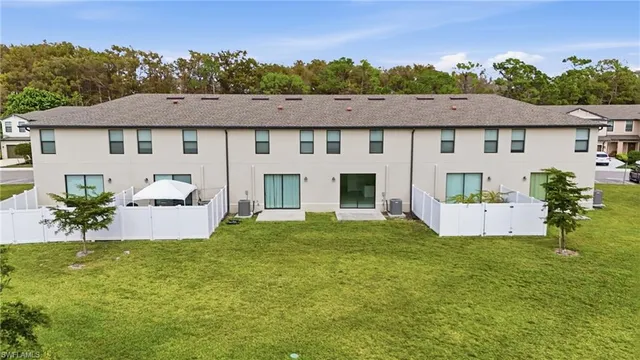 a view of a backyard of the house