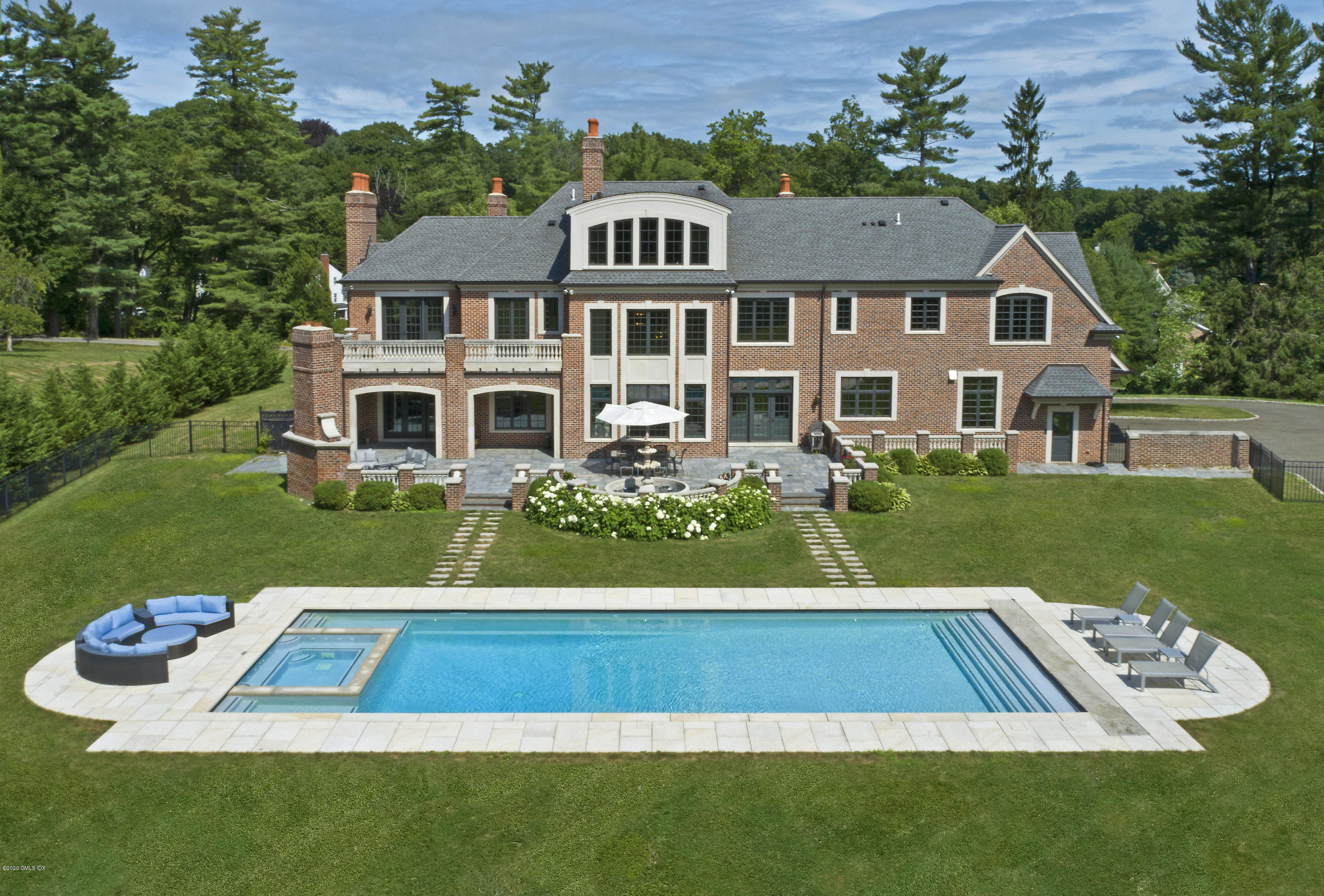 29 Doubling Road Greenwich, CT 06830 - Photo 26 of 26 a view of a house with a swimming pool