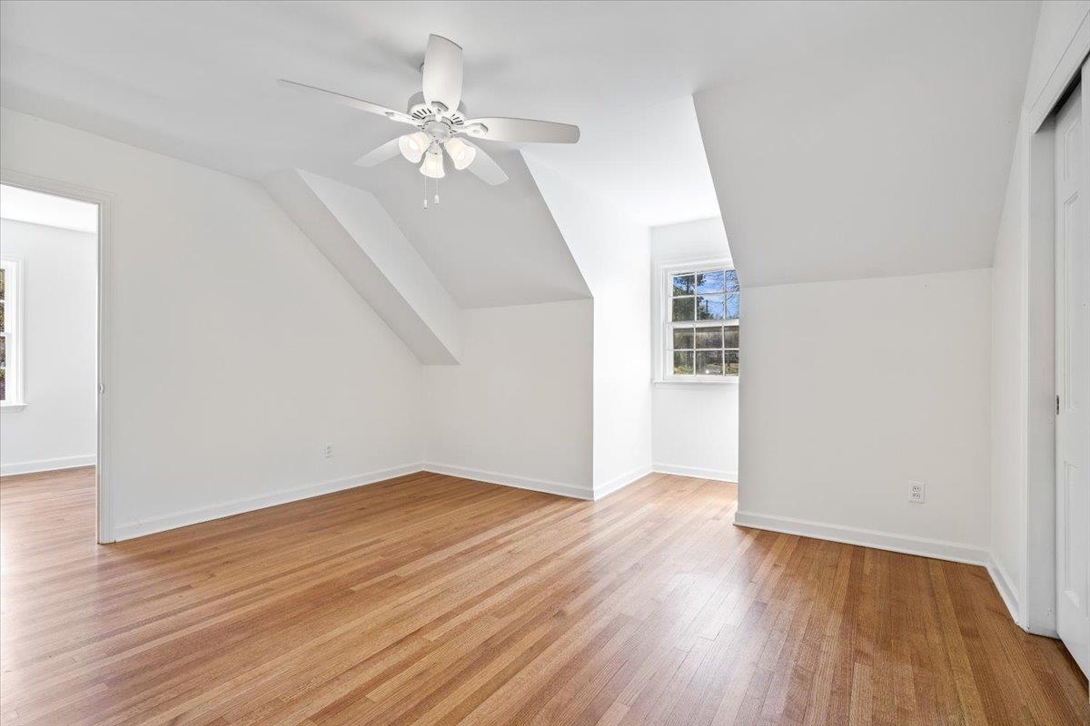 5600 Normandy Road Memphis, TN 38120 - Photo 26 of 28 Bonus room with light wood-style flooring, lofted ceiling, baseboards, and ceiling fan