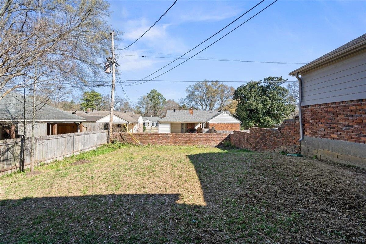 5600 Normandy Road Memphis, TN 38120 - Photo 28 of 28 View of yard featuring fence