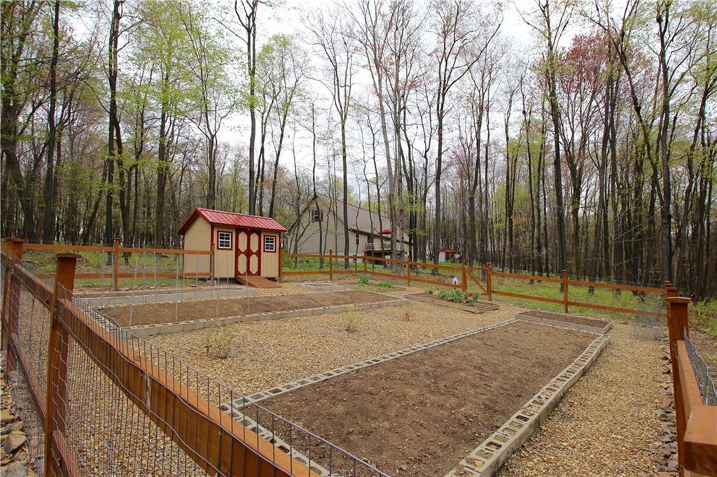 101 Pisor Road Hilliards, PA 16040 - Photo 22 of 25 Raised garden beds and garden shed completely fenced