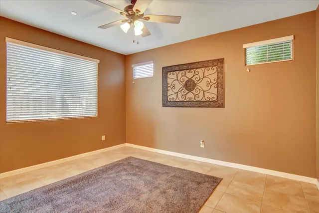 a bathroom with a sink mirror and toilet