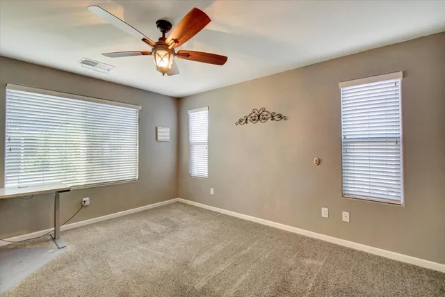 a bathroom with a sink double vanity and a mirror