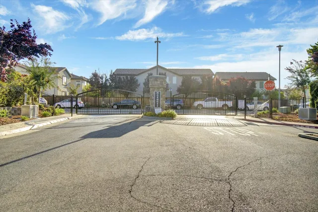 a view of a street with a building
