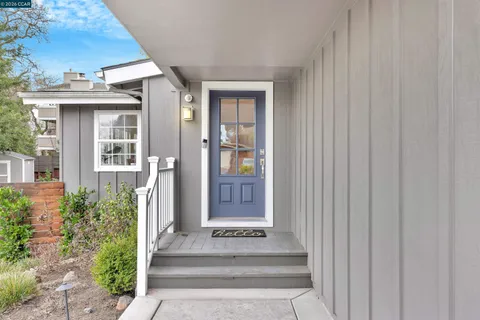 a front view of a house with a porch