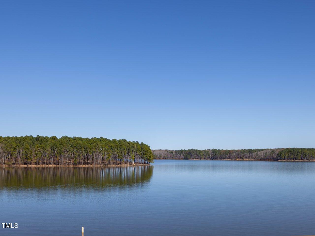 422 Lower Thrift Road New Hill, NC 27562 - Photo 11 of 14 a view of lake and mountain