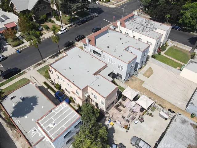 an aerial view of a large building with a outdoor space
