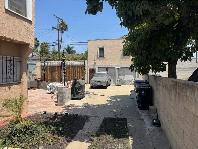 a view of a patio with swimming pool