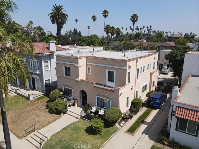 a view of city from balcony with seating space