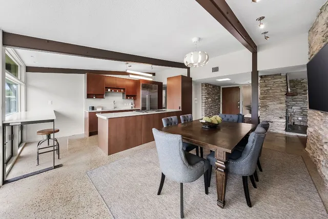 a view of a dining room with furniture