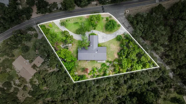 a view of a garden from a balcony
