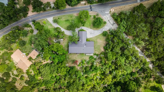 a view of a garden with a fountain