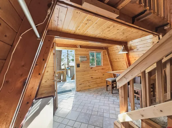 a kitchen with stainless steel appliances granite countertop a refrigerator and a stove
