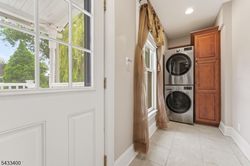 61 New Street Hampton, NJ 08827 - Photo 13 of 45 a view of a hallway with washer and dryer