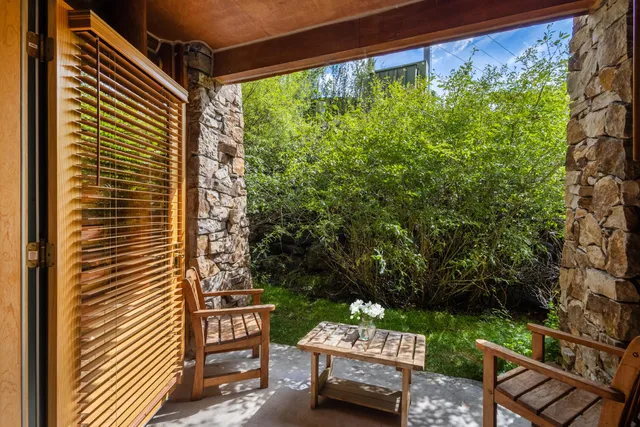 a view of porch with a bench