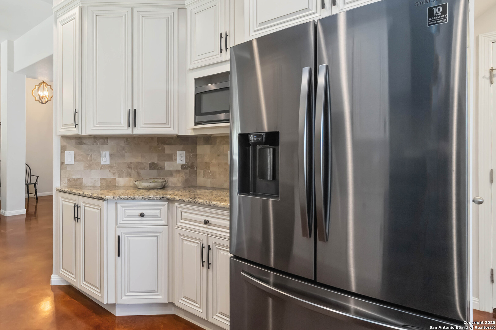 342 Wood View Circle Bandera, TX 78003 - Photo 14 of 45 a kitchen with stainless steel appliances granite countertop a refrigerator and a stove