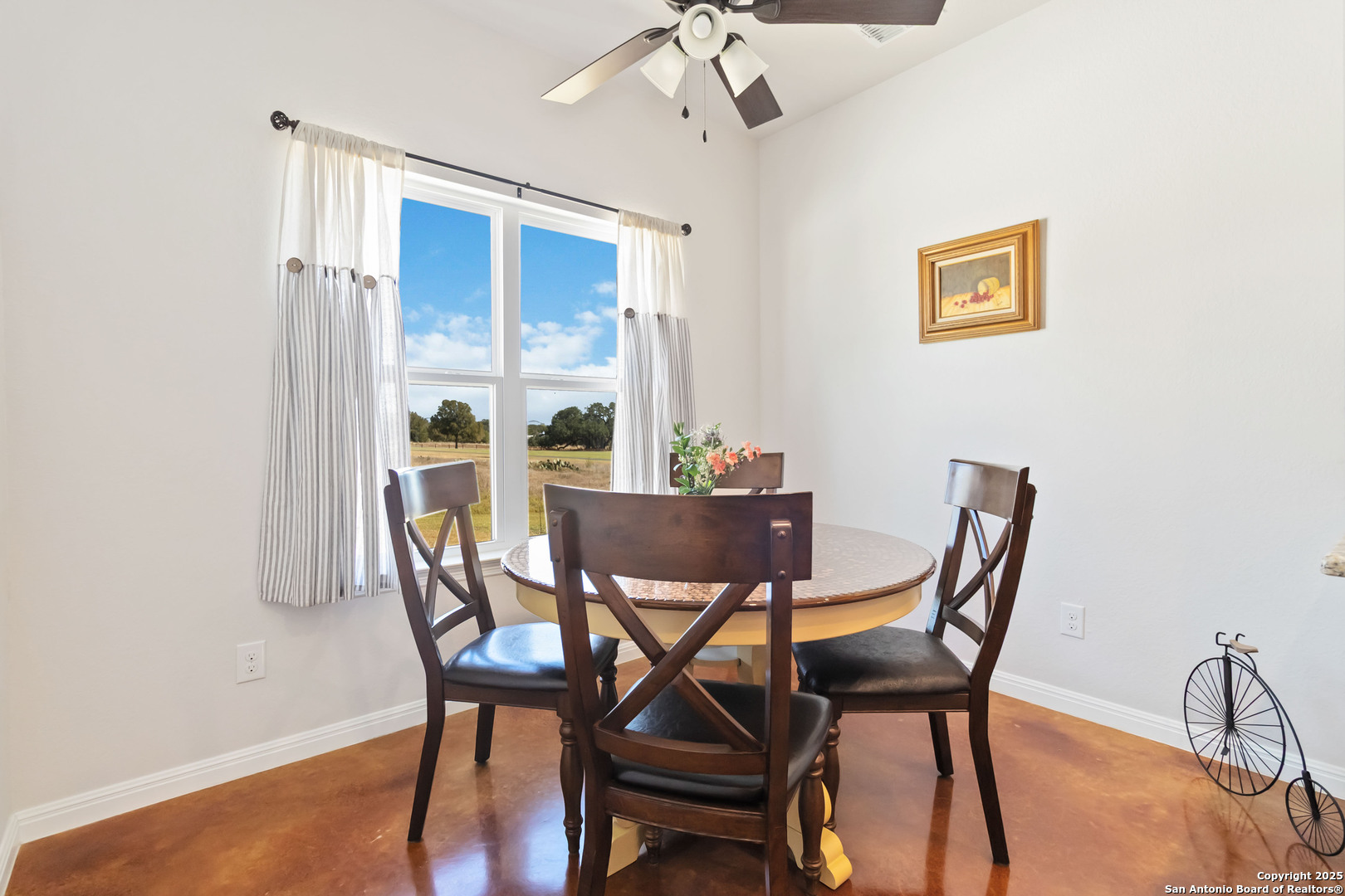 342 Wood View Circle Bandera, TX 78003 - Photo 16 of 45 a view of a dining room with furniture window and wooden floor