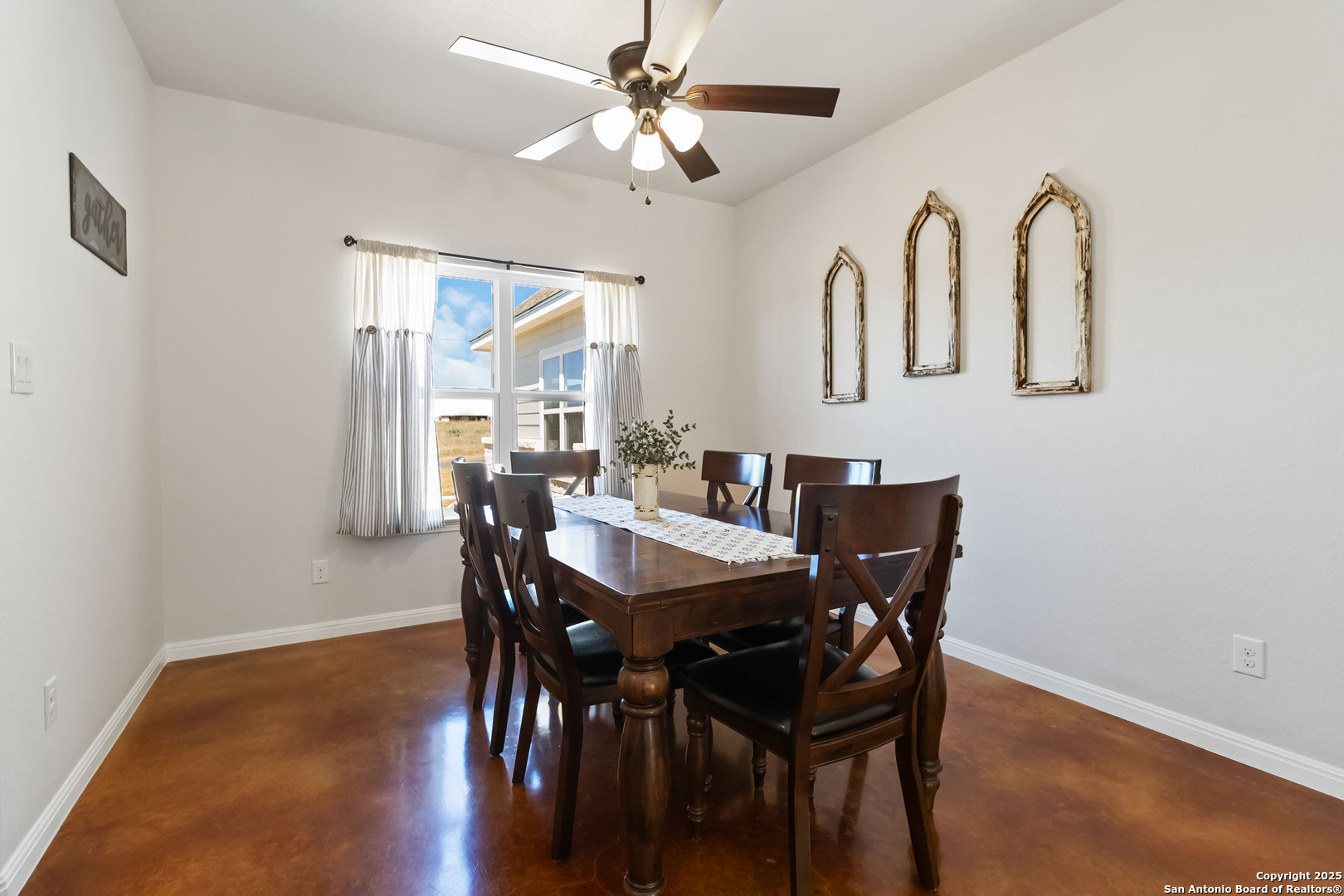 342 Wood View Circle Bandera, TX 78003 - Photo 17 of 45 a view of a dining room with furniture and wooden floor