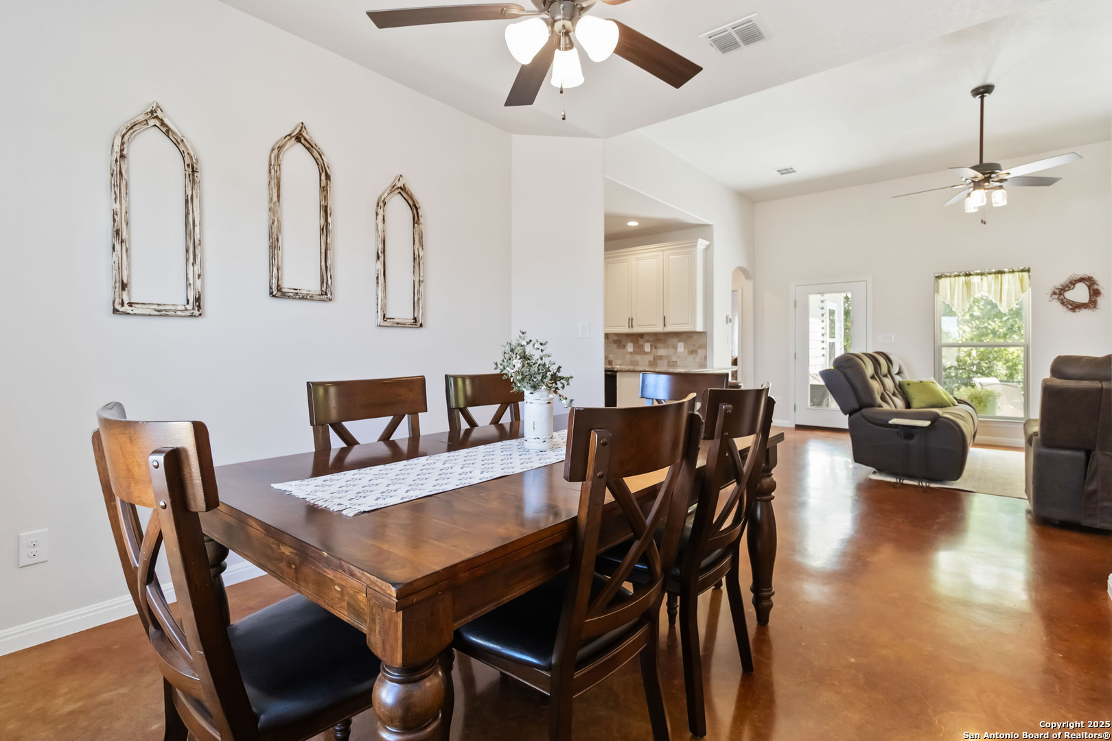 342 Wood View Circle Bandera, TX 78003 - Photo 20 of 45 a view of a dining room with furniture and wooden floor