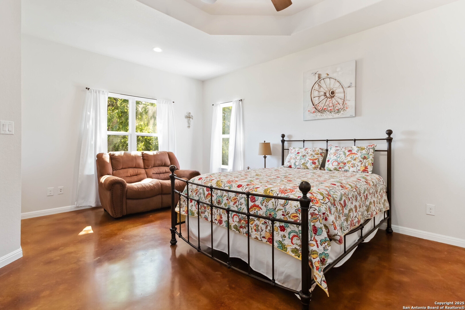 342 Wood View Circle Bandera, TX 78003 - Photo 22 of 45 a bed room with a bed and a couch