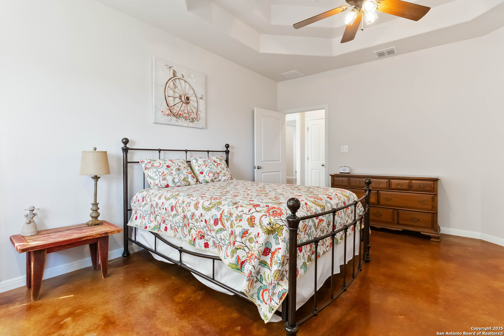 342 Wood View Circle Bandera, TX 78003 - Photo 23 of 45 a bedroom with a bed and a table