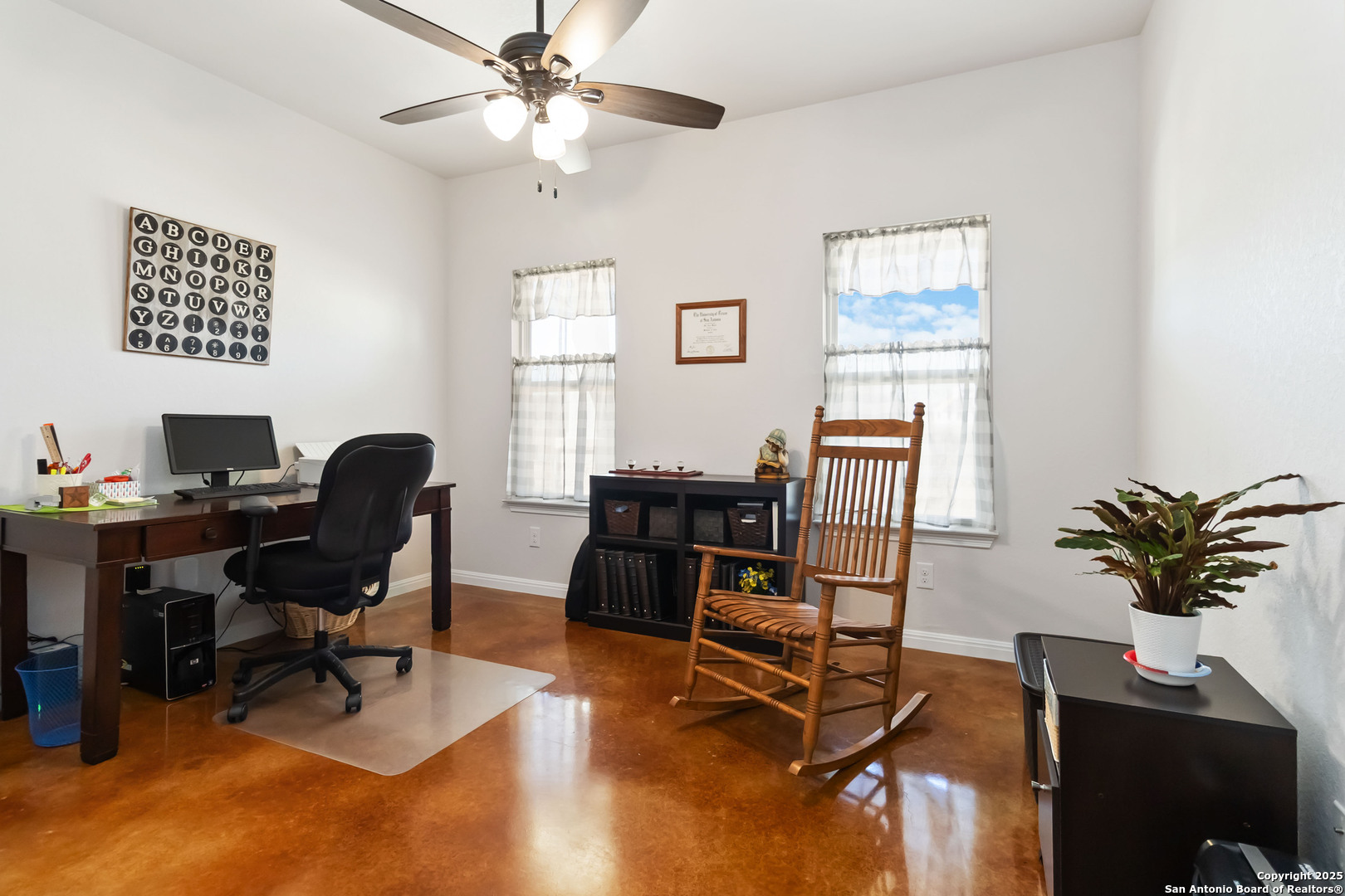 342 Wood View Circle Bandera, TX 78003 - Photo 27 of 45 a view of a workspace with furniture and a window