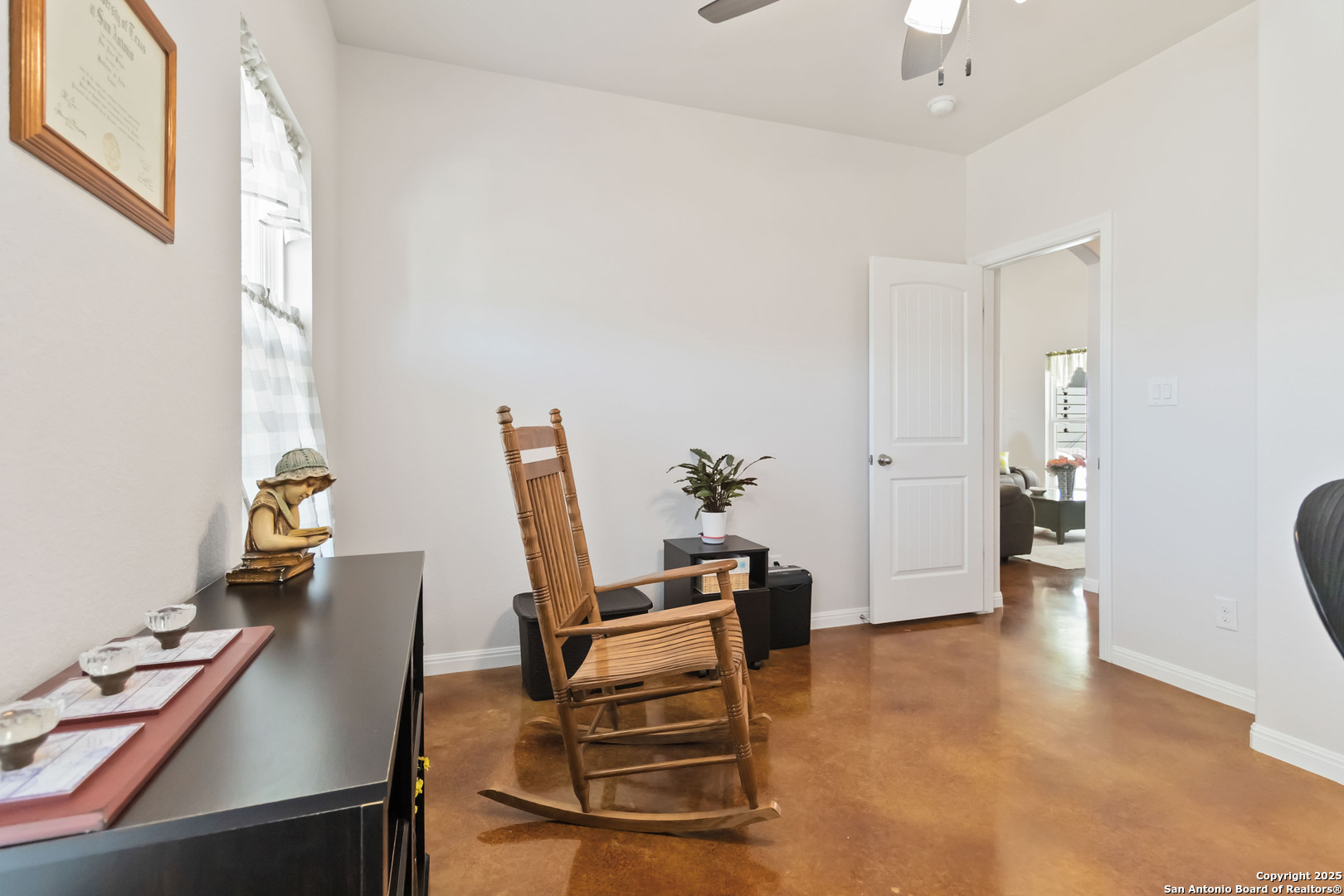342 Wood View Circle Bandera, TX 78003 - Photo 28 of 45 a room with furniture and a wooden floor