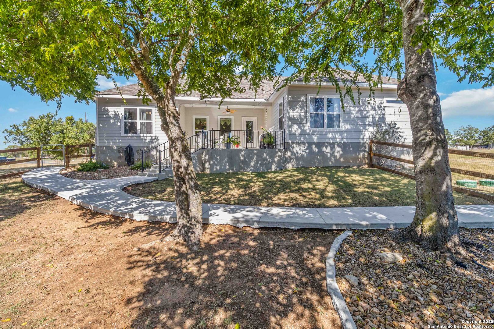 342 Wood View Circle Bandera, TX 78003 - Photo 38 of 45 a front view of a house with a yard