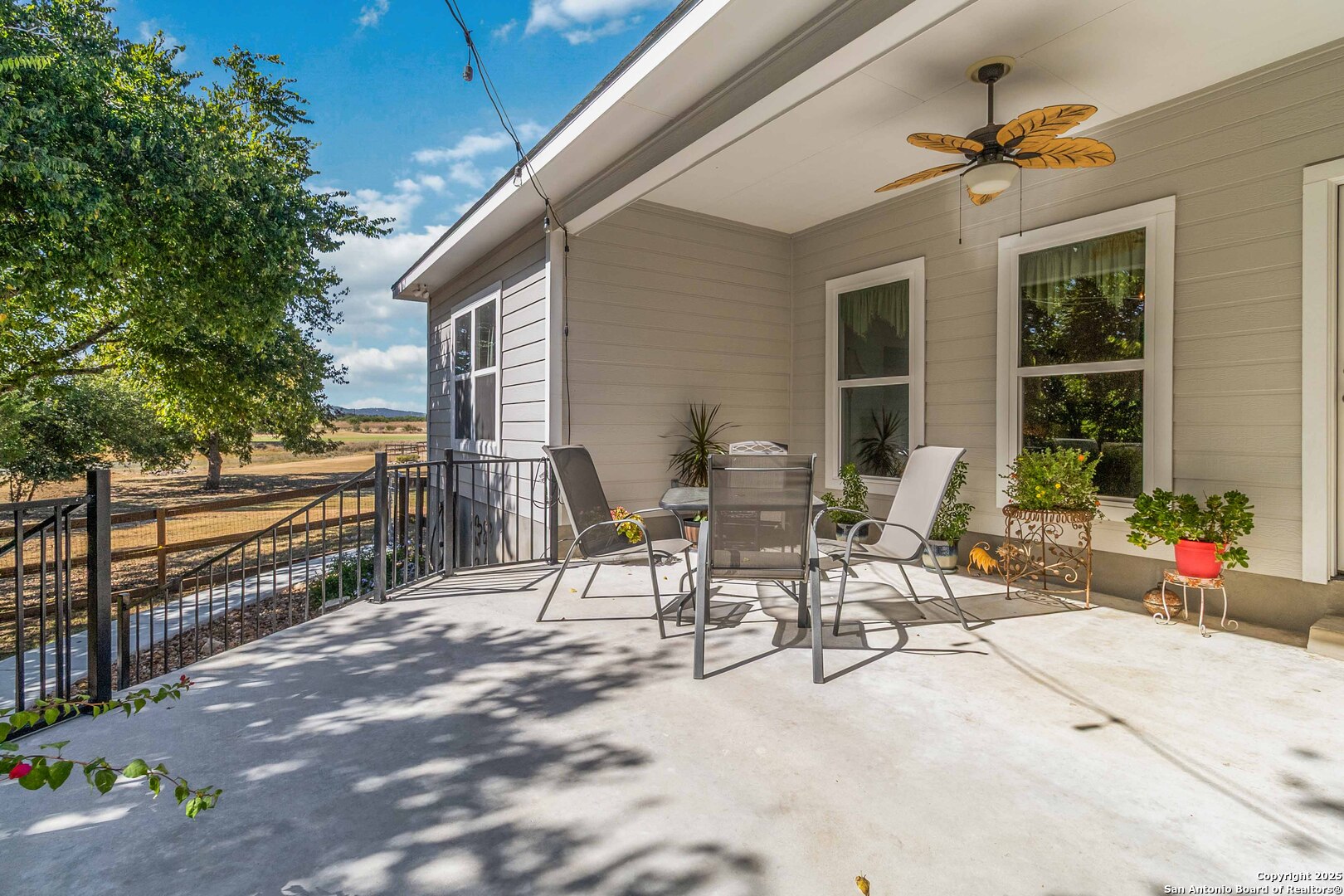 342 Wood View Circle Bandera, TX 78003 - Photo 39 of 45 a view of a patio with table and chairs and potted plants