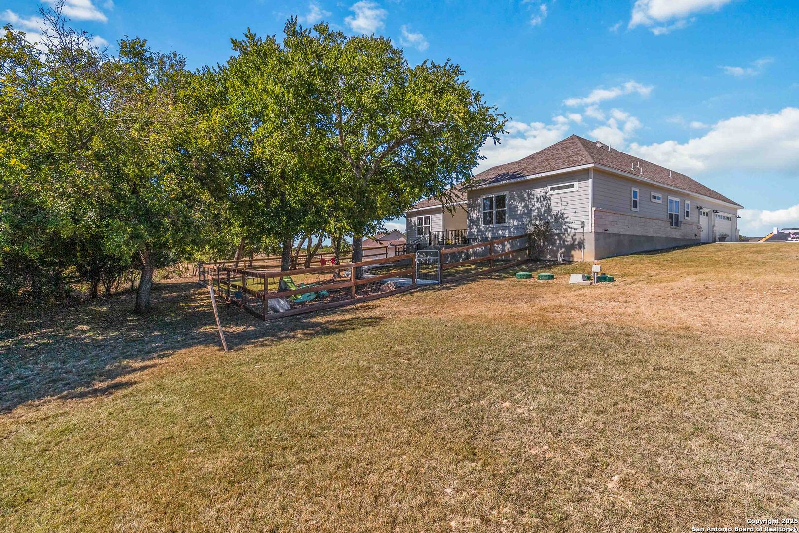 342 Wood View Circle Bandera, TX 78003 - Photo 43 of 45 a view of a house with a yard