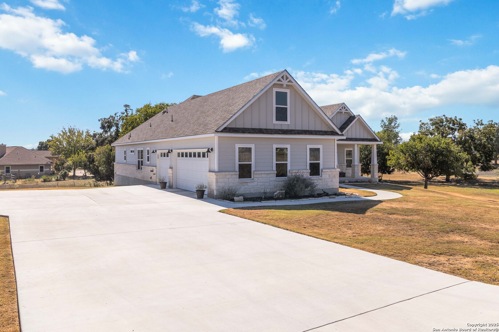 342 Wood View Circle Bandera, TX 78003 - Photo 5 of 45 a front view of a house with a yard