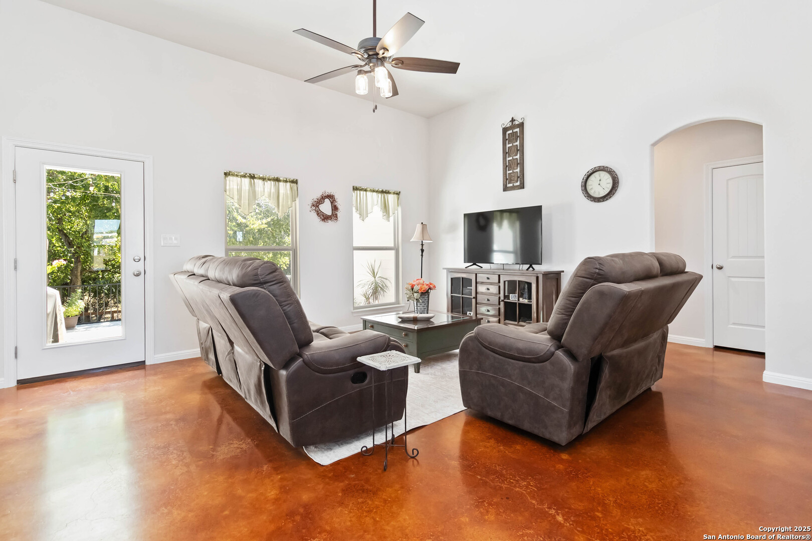 342 Wood View Circle Bandera, TX 78003 - Photo 6 of 45 a living room with furniture and a flat screen tv