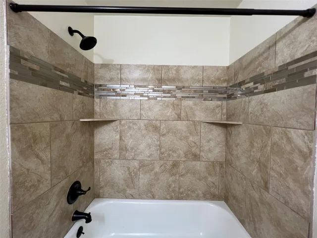 a bathroom with a bathtub