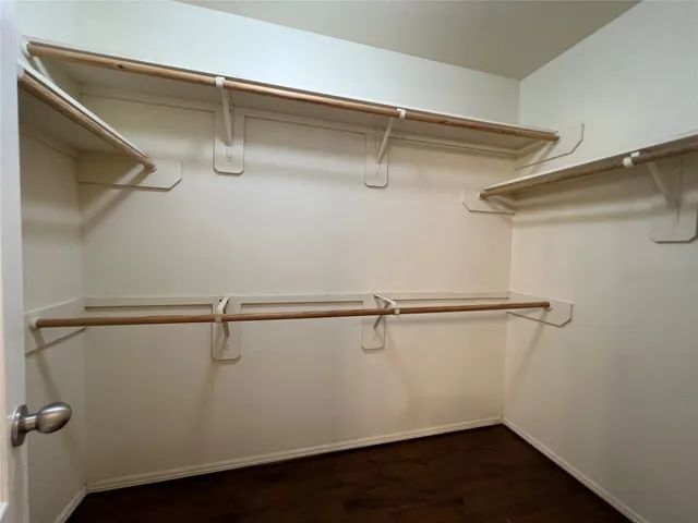 a view of a room with racks on the wall