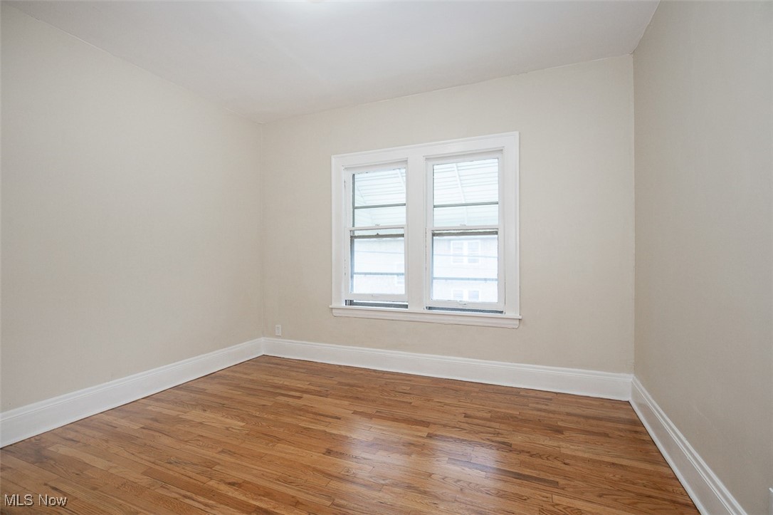 3616 Hildana Road Cleveland, OH 44120 - Photo 25 of 27 Unfurnished room with light wood finished floors and baseboards