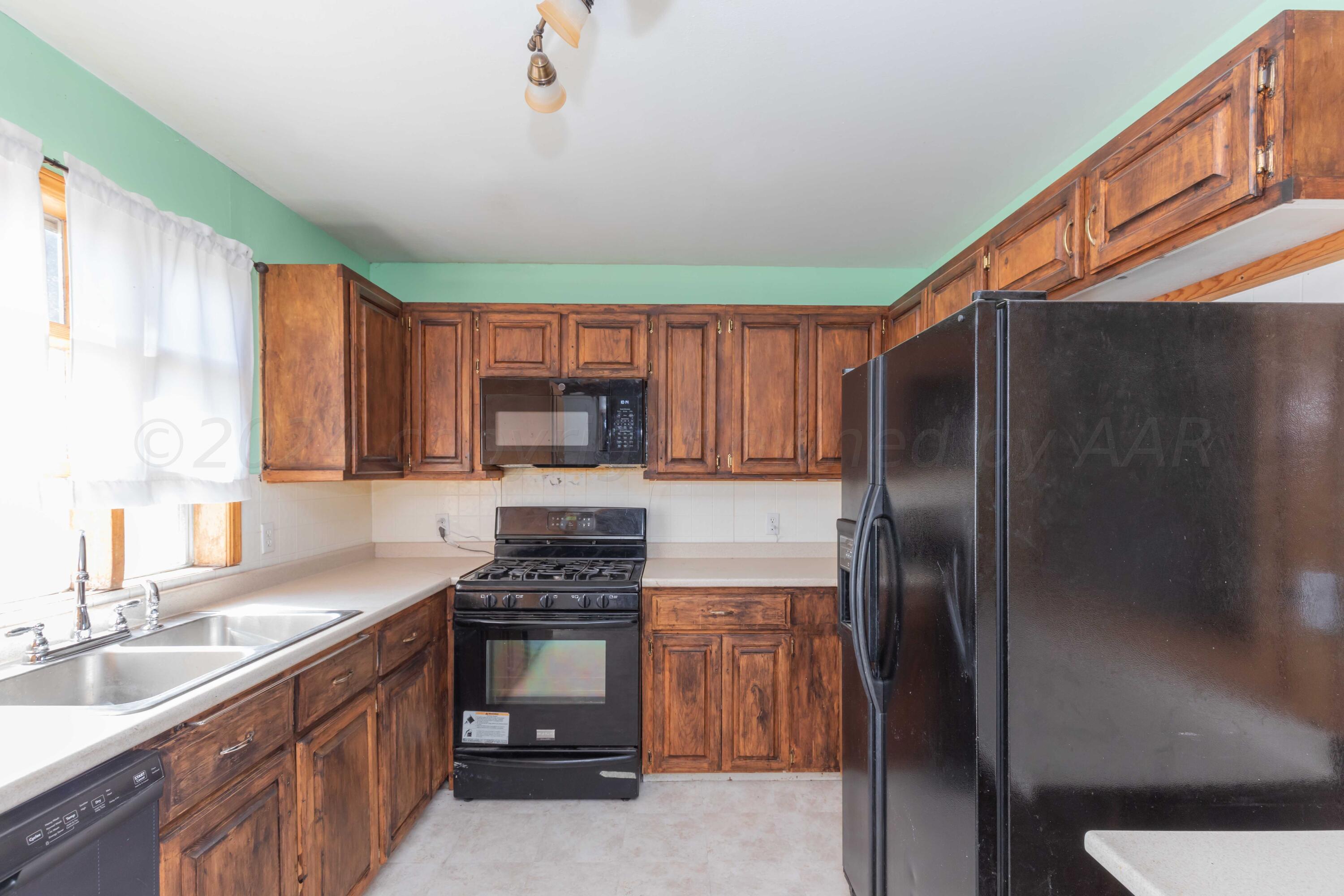 25501 Adkisson Road Umbarger, TX 79015 - Photo 11 of 34 KITCHEN VIEW 3