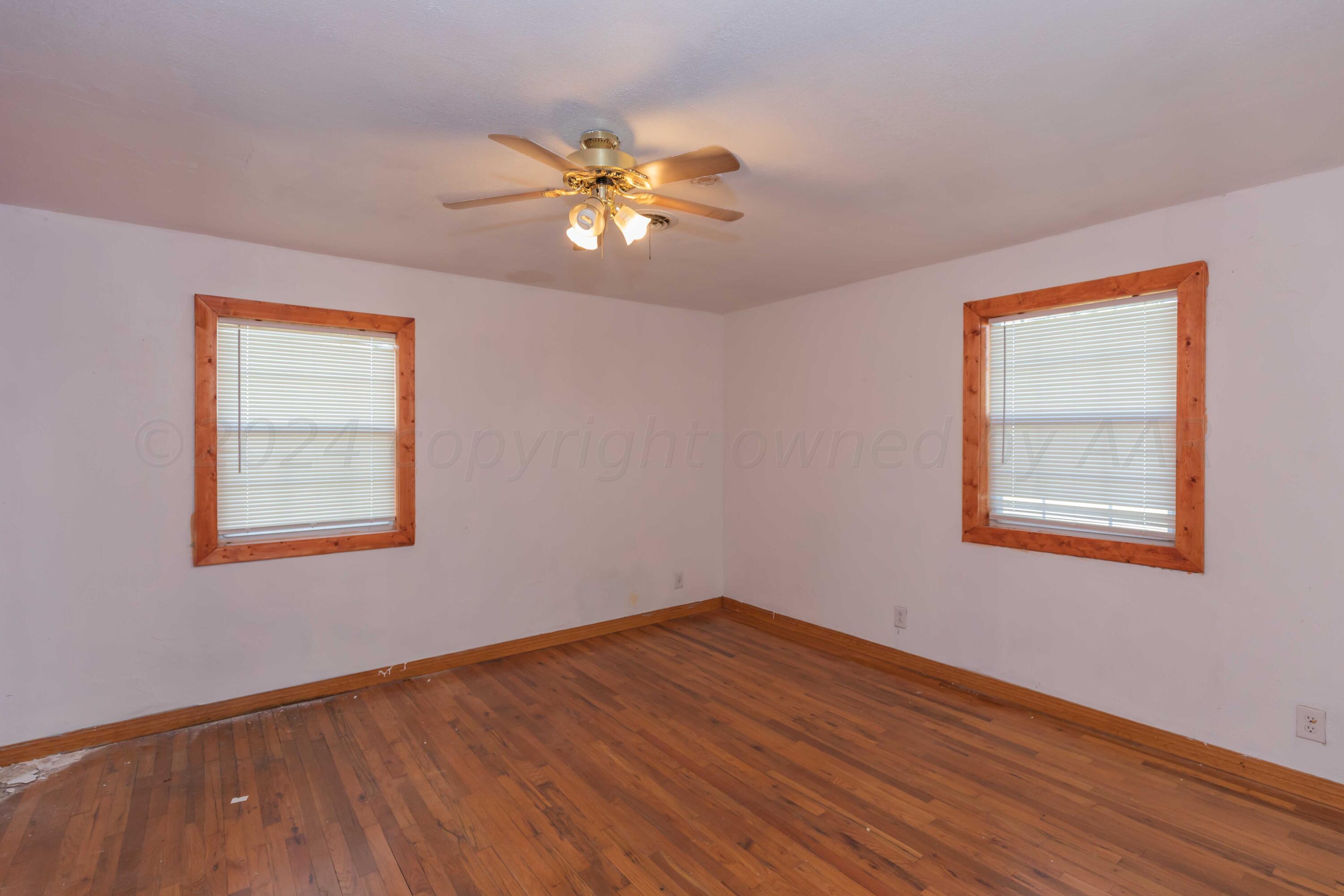 25501 Adkisson Road Umbarger, TX 79015 - Photo 19 of 34 BEDROOM 2 VIEW 1