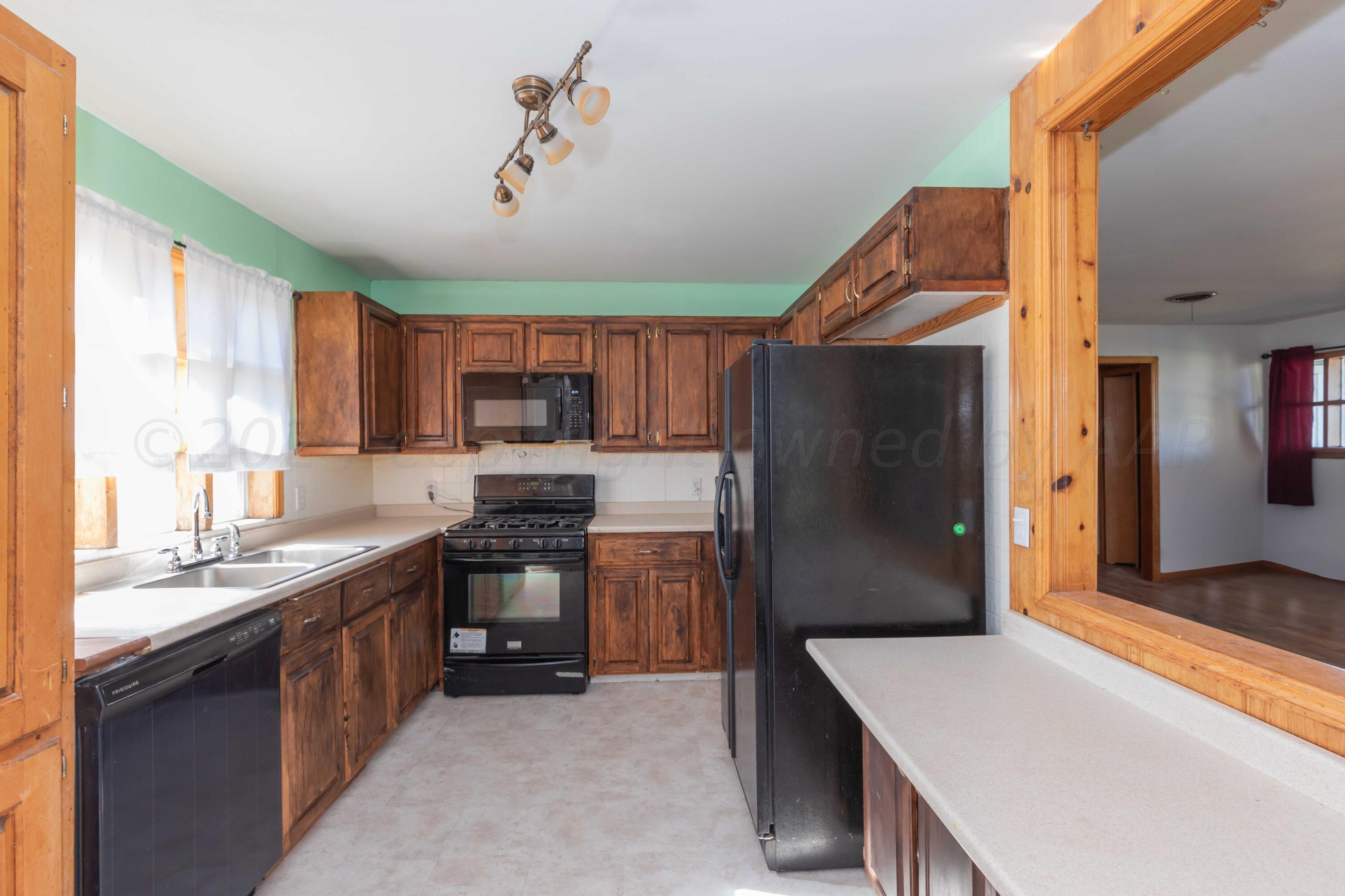 25501 Adkisson Road Umbarger, TX 79015 - Photo 10 of 34 KITCHEN VIEW 1